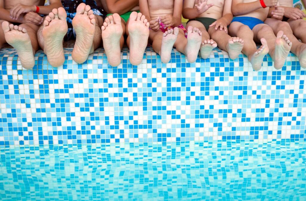 warm climates and shared floors like at the swimming pool can all increase your risk of getting a fungal nail infection