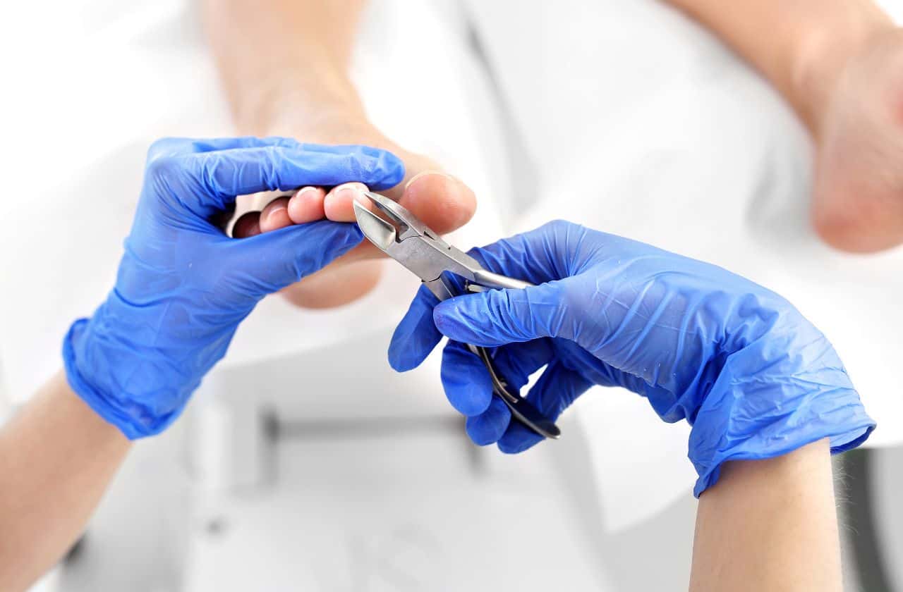 Podiatrist working on a senior persons foot